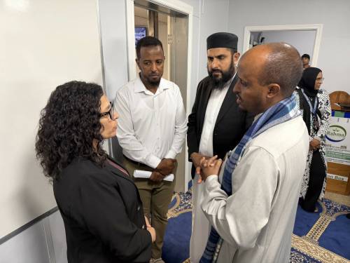 Culture Minister Nellie Kennedy (left) speaks with leaders from Winnipeg&rsquo;s Muslim community, including Rahma Islamic Centre director and Imam Feisel Adem and Manitoba Islamic Association chair Hakim Ghulam, at the centre on Thursday. (Morgan Modjeski/Winnipeg Free Press)
