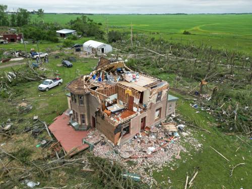 The devastation to the home and property belonging to Brian and Bernadine Brown south of Rossburn is visible after a powerful tornado hit the property on June 28 while the couple was inside. Bernadine said a more targeted warning system would give greater significance to extreme weather alerts. (Tim Smith/The Brandon Sun files)