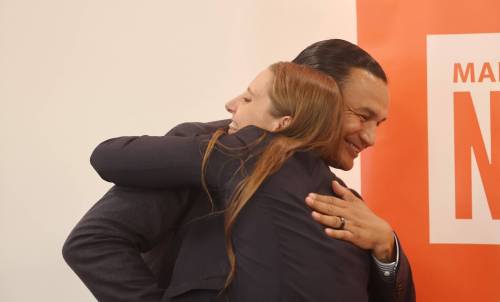 Manitoba Premier Wab Kinew (right) hugs newly named Brandon West NDP candidate Cora Dupuis after Dupuis&rsquo; nomination on Thursday evening. (Alex Lambert/The Brandon Sun)