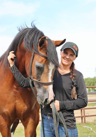 Ashley Lauren Wilson and her Arabian mare, Envy, outside the outdoor arena at the Keystone Centre on Monday, the day before the duo's first show at the 2026 Canada's National Arabian Championship. (Rylee Gerrard/The Brandon Sun)