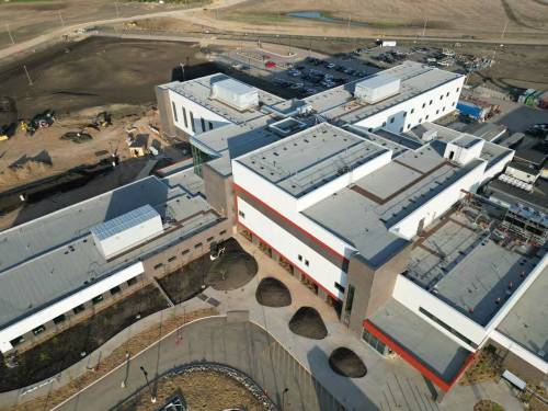 An aerial photo taken in June shows the progress of construction on the new Neepawa Health Centre, now set to open in mid to late 2027. (Supplied)
