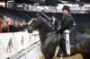 Sara Embury with Milligan Training pets her horse KT Cloudstorm, ridden by Erica Milligan, after the horse and rider competed in the half-Arabian country English pleasure ladies and gentlemen to ride category at Canada&rsquo;s National Arabian Championship at the Keystone Centre on Friday. The Arabian show wraps up today.