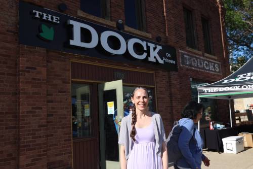 The Dock on Princess general manager Erin Wells stands in front of the restaurant in June. (Abiola Odutola/The Brandon Sun files)