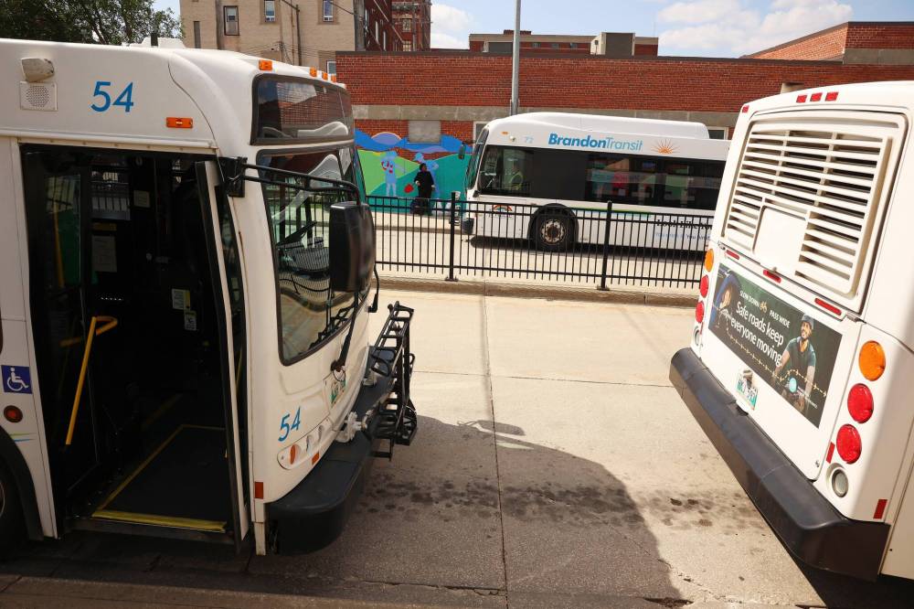 Transit buses stop at the Brandon Transit Downtown Terminal on Tuesday. (Tim Smith/The Brandon Sun)