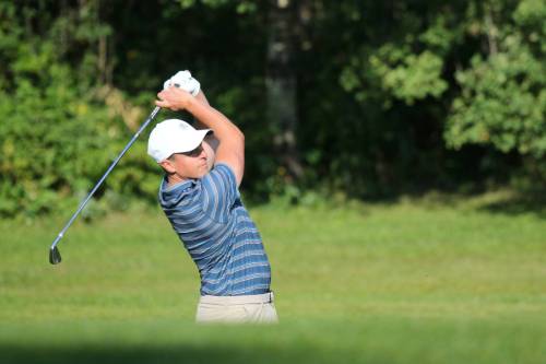Kody Fawcett hits an approach shot during the Tamarack golf tournament men's semifinals at Clear Lake Golf Course on Friday. (Thomas Friesen/The Brandon Sun)