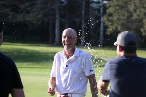 Jason Thorpe's friends shower him with beer after his Tamarack final win at Clear Lake Golf Course on Saturday. (Thomas Friesen/The Brandon Sun)