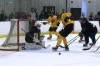 Team Black goalie Ryley Budd (33) watches as the puck squirts between the legs of Team Gold forward Brady Turko during the annual Black and Gold game at J&G Homes Arena on Sunday evening that signals the end of training camp. (Perry Bergson/The Brandon Sun)