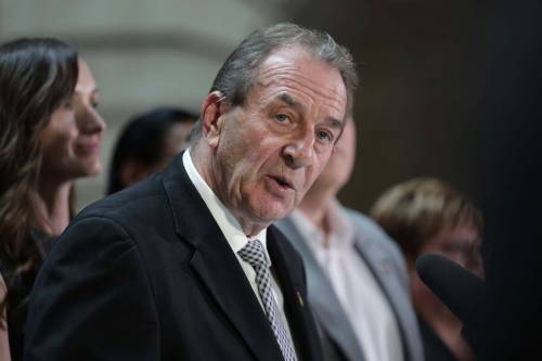 Agriculture Minister Ron Kostyshyn, the MLA for Dauphin, speaks during a press conference on tariff support at the Manitoba legislature in Winnipeg on Friday. (Ruth Bonneville/Winnipeg Free Press)
