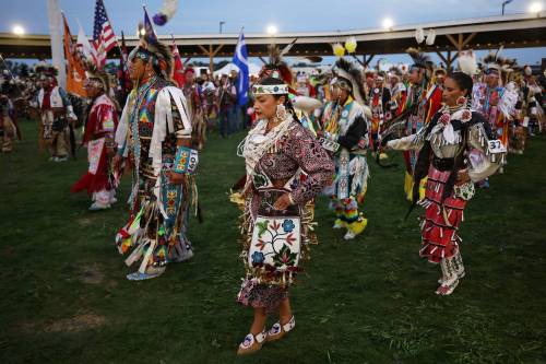 Dancers make the grand entry on the opening evening of the Birdtail Sioux Dakota Nation Wacipi (Powwow) on Friday. The powwow marked the nation’s first powwow in 15 years and is being held all weekend at Birdtail’s brand new powwow arbour. (Tim Smith/The Brandon Sun)