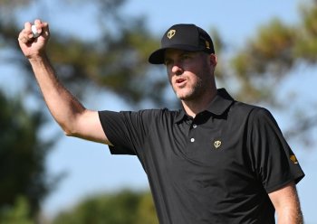 International team member Taylor Pendrith of Canada, reacts after winning the 8th hole during their fifth round singles match at the Presidents Cup golf tournament at Royal Montreal Golf Club on Sunday, September 29, 2024 in Montreal. THE CANADIAN PRESS/Graham Hughes