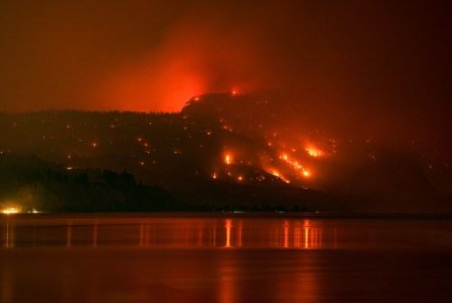 The Bald Range wildfire, that has forced 20,000 people out of their homes in the south Okanagan region, burns in Summerland, B.C., late Saturday, Aug. 8, 2026. THE CANADIAN PRESS/Darryl Dyck