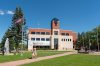 A person walks in front of Prince Albert City Hall in Sask., on Tuesday, July 12, 2022. THE CANADIAN PRESS/Heywood Yu