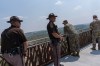 North Dakota Highway Patrol police officers and service members stand by at Burning Hills Amphitheatre during the Theodore Roosevelt Presidential Library opening ceremony, Wednesday, July 1, 2026, in Medora, N.D. (AP Photo/Julia Demaree Nikhinson)