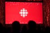 The CBC logo is projected onto a screen in Toronto on May 29, 2019. THE CANADIAN PRESS/Tijana Martin