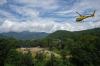 Private and military helicopters are deployed to rescue people stranded in areas cut off by flash flooding in Nepal's Nuwakot district, Monday, Aug. 31, 2026. (AP Photo/Rajesh Kumar Singh)