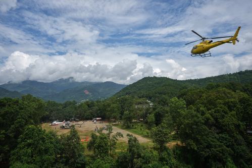 Private and military helicopters are deployed to rescue people stranded in areas cut off by flash flooding in Nepal's Nuwakot district, Monday, Aug. 31, 2026. (AP Photo/Rajesh Kumar Singh)
