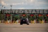 Vehicles approach the United States border as seen at Saint Bernard de Lacolle, Que., on Monday, July 21, 2025. THE CANADIAN PRESS/Christopher Katsarov