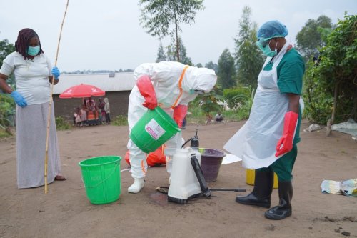 Wiza Bondele, centre, a health worker on the prevention and control team, seen at work in Ituri province, eastern Congo, Wednesday, Aug 5, 2026. (AP Photo/Dieudonne Dirole)