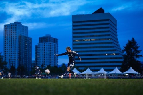 Vancouver Whitecaps' Tate Johnson takes a shot on goal during the second half of a Canadian Championship quarterfinal soccer match against Cavalry FC, in Burnaby, B.C., on Wednesday, July 8, 2026. THE CANADIAN PRESS/Darryl Dyck