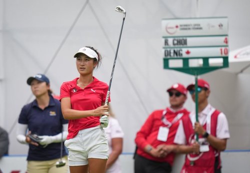 Aphrodite Deng, of Canada, watches her tee shot on the 17th hole during the third round at the LPGA CPKC Canadian Women's Open golf tournament, in Edmonton, on Saturday, Aug. 22, 2026. THE CANADIAN PRESS/Darryl Dyck
