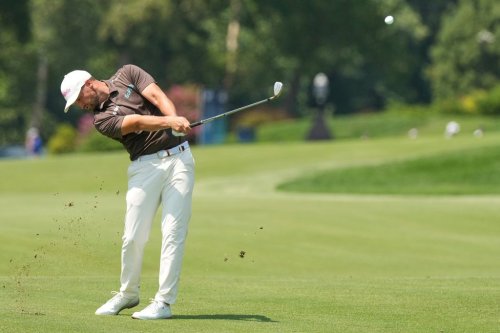 Wyndham Clark hits from the fourth fairway during the third round of the BMW Championship golf tournament Saturday, Aug. 22, 2026, in St. Louis. (AP Photo/Jeff Roberson)