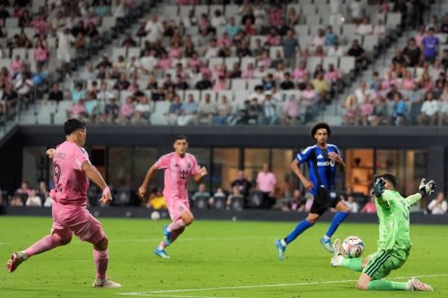 Inter Miami forward Luis Suarez scores his side's fourth goal past CF Montreal goalkeeper Thomas Gillier (31) during the second half of an MLS soccer match, Saturday, Aug. 29, 2026, in Miami. (AP Photo/Rebecca Blackwell)