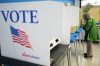 A voter cast a ballot on the first day of early voting in Minnesota at the Elections & Voter Services building, Friday, Sept. 18, 2026, in Minneapolis. (AP Photo/Ellen Schmidt)