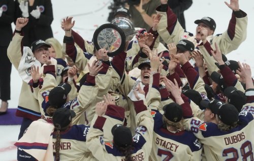 Montreal Victoire players celebrate after defeating the Ottawa Charge to win the PWHL championship in Ottawa on May 20, 2026. THE CANADIAN PRESS/Adrian Wyld