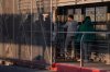 FILE - A group of undocumented migrants is deported by U.S. Immigration and Customs Enforcement agents across the McAllen–Hidalgo–Reynosa International Bridge in McAllen, Texas, March 13, 2026. (AP Photo/Felix Marquez, File)