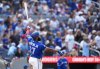 Blue Jays first baseman Vladimir Guerrero Jr., watches his ball after hitting a solo home run against the Baltimore Orioles in a Major League Baseball game in Toronto on Sept. 13, 2026. THE CANADIAN PRESS/Nathan Denette