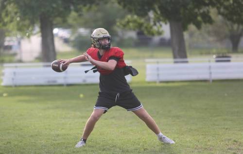 Jake Cory loads up to throw the ball at practice yesterday. The Grade 10 quarterback looked good in preseason and is ready to step into the starting role. (Rowan McCarthy/The Brandon Sun)