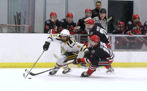 Brandon Wheat Kings defenceman Max Dawson (4) tries to skate himself out of trouble as Southwest Cougars forwards Shane Elder (10) and Jack Polasek (21) pursue during Game 1 of their Manitoba U18 AAA Hockey League quarterfinal series at J&G Homes Arena on Feb. 28, 2026. Dawson will make his junior hockey debut this year with Waywayseecappo. (Perry Bergson/The Brandon Sun)