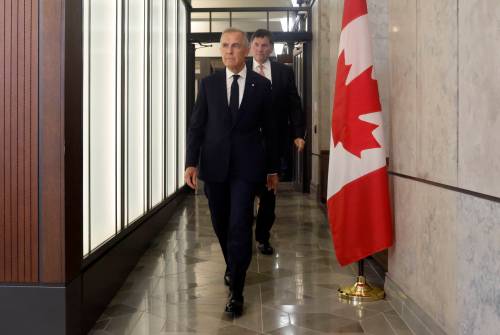 Prime Minister Mark Carney and Canada-U.S. Trade Minister Dominic LeBlanc arrive at a news conference about Canada&rsquo;s response to new U.S. tariffs on Parliament Hill in Ottawa on Aug. 22. Mariane Bourcheix-Laporte writes that, to protect its culture, Canada had to draw a line in its trade negotiations with the United States. (The Canadian Press files)