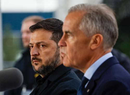 Prime Minister Mark Carney (right) and Volodymyr Zelenskyy, president of Ukraine, speak after signing agreements in Calgary, Alta., Thursday. (The Canadian Press files)