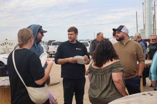Westman Lumber Supply general manager Kevin Fast talks to customers during the company&rsquo;s 10th year anniversary celebration on Friday afternoon. (Abiola Odutola/The Brandon Sun)