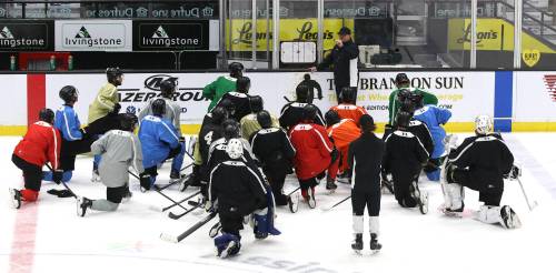 Brandon Wheat Kings players listen to head coach and general manager Marty Murray outline a drill during practice on Friday afternoon at Assiniboine Credit Union Place. (Perry Bergson/The Brandon Sun) Sept. 18, 2026