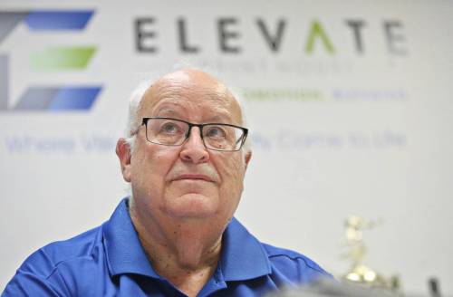 Tom Wenham, manager for what is now called Elevate Print House, takes a moment to reflect during an interview in his Fifth Street office on Monday morning. (Matt Goerzen/The Brandon Sun)
