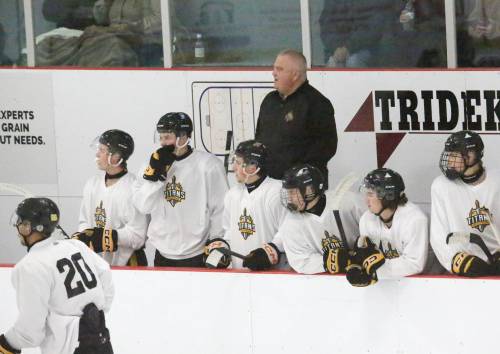 Ken Pearson stands on the bench during the MJHL game between Neepawa and Portage on Saturday. Pearson signed a multi-year extension with the Titans during the offseason. (Rowan McCarthy/The Brandon Sun)