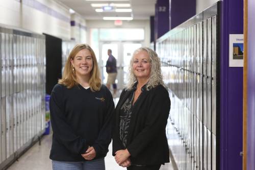 Brandon School Division assistant superintendent of student services Susan Gilleshammer (right) stands with NorthStar Project project facilitator Katey Rogowsky in the hallway at Vincent Massey High School on Friday afternoon before the after-school tutoring and mentoring program starts. (Abiola Odutola/The Brandon Sun)