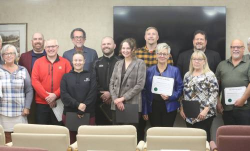 Some donors and supporters of Hobbs Manor hold their appreciation certificates after a donor appreciation event at the seniors' residence on Friday. (Abiola Odutola/The Brandon Sun)