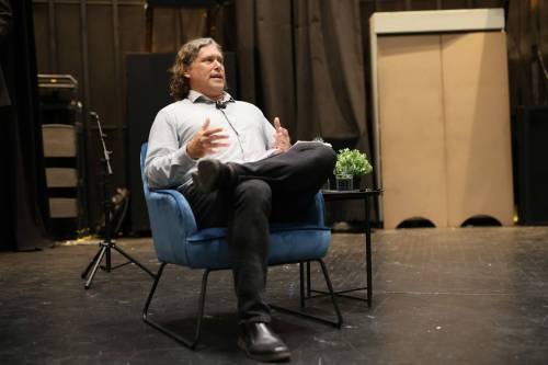 Brandon Mayor Jeff Fawcett answers questions from panellists during a forum at Brandon University's Evans Theatre on Tuesday evening. (Tim Smith/The Brandon Sun)