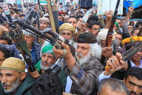 Supporters of Yemen&rsquo;s Houthi rebels raise their rifles during a rally in support of the group and to protest Saudi Arabia&rsquo;s accusation that the Houthis targeted Islam&rsquo;s holiest site of Mecca in Sanaa, Yemen on Friday. (The Associated Press files)