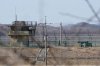 FILE - South Korean army soldiers patrol along the barbed-wire fence in Paju, South Korea, near the border with North Korea, on Feb. 18, 2025. (AP Photo/Ahn Young-joon, File)