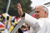 Pope Leo XIV waves to the crowd on the Champs Elysees avenue before a mass at the Place de la Concorde in Paris, Saturday, Sept. 26, 2026. (AP Photo/Emma Da Silva)