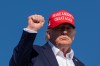 President Donald Trump gestures while boarding Air Force One at Morristown Airport, Monday, Sept. 7, 2026, in Morristown, N.J. (AP Photo/Julia Demaree Nikhinson)
