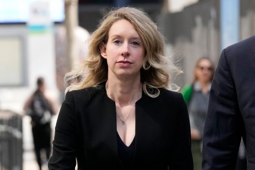 Former Theranos CEO Elizabeth Holmes leaves federal court in San Jose, Calif., March 17, 2023. (AP Photo/Jeff Chiu, File)