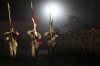 Comrades of fallen Canadian Sgt. Martin Goudreault line up before his casket is carried onto a plane during a ramp ceremony at Kandahar Airfield, Afghanistan on Tuesday, June 8, 2010. (AP Photo/Anja Niedringhaus)