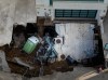 An aerial view of a sinkhole which collapsed the driveway of a coastal mansion owned by actor Nicolas Cage Tuesday, Sept. 8, 2026, in Malibu, Calif. (AP Photo/Ethan Swope)