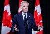 Prime Minister Mark Carney speaks to the media at a cabinet retreat in Banff, Alta., Thursday, Sept. 10, 2026. THE CANADIAN PRESS/Jeff McIntosh
