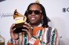 FILE - Lil Durk poses for a photo in the press room with the award for best melodic rap performance for 